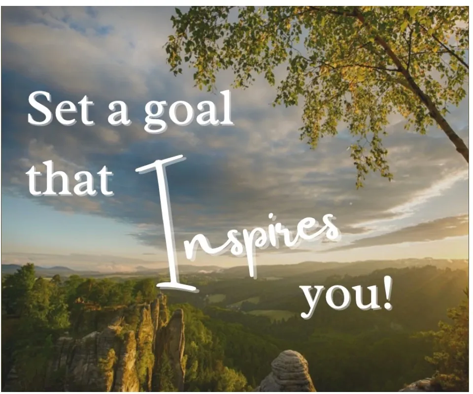 A notebook and pen on a desk, open to a page for setting goals